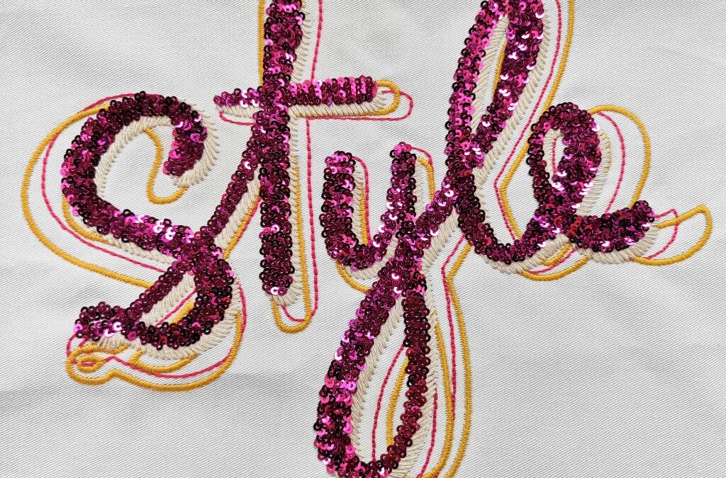 Bordado palabra de lentejuelas y festón